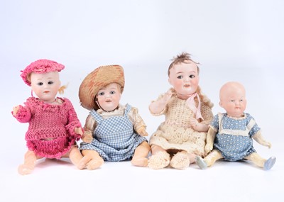 Lot 983 - Four small German character baby dolls