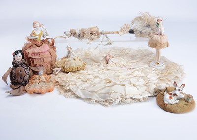 Lot 992 - Eight pin cushions or half dolls