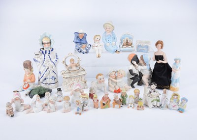 Lot 993 - A collection of 19th century bisque and china children