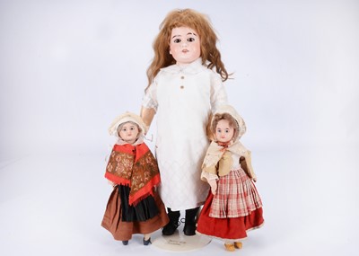 Lot 1013 - Three bisque headed dolls