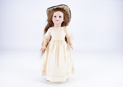 Lot 1015 - A small Simon and Halbig DEP bisque headed child doll