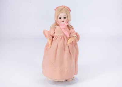 Lot 1033 - A small Simon & Halbig 1079 DEP bisque headed child doll