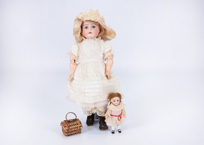 Lot 1034 - A Kestner 192 child doll with baby