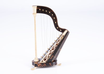 Lot 1043 - A 19th century miniature doll's harp