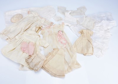Lot 1049 - A selection of 19th century and later doll's white and cream clothes