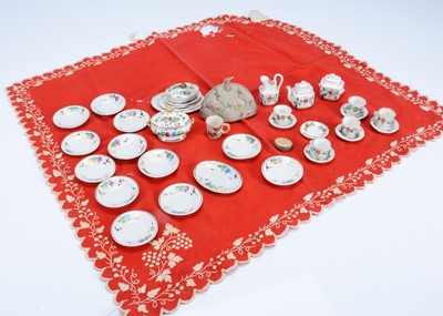 Lot 1055 - 19th century fashion doll's dinner and tea set