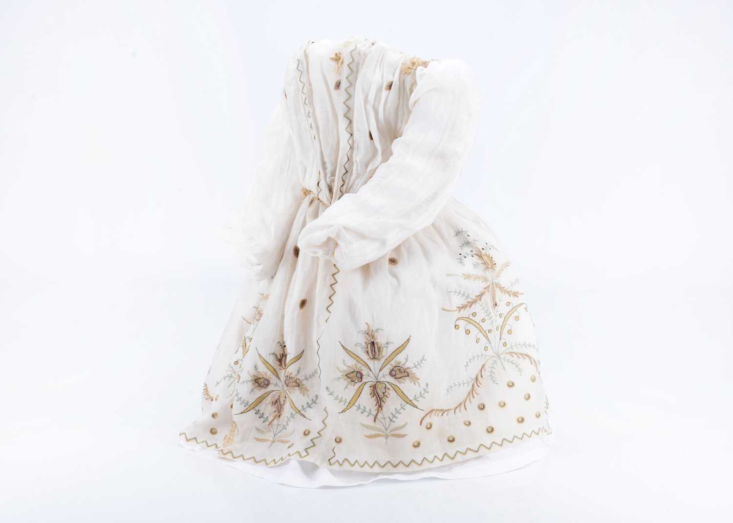 Lot 1069 - A dolls ensemble from an 18th century doll