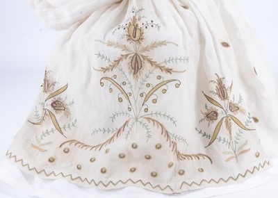Lot 1069 - A dolls ensemble from an 18th century doll