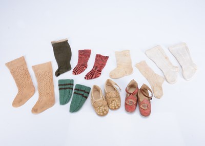 Lot 1072 - Two pairs of large doll or baby slippers