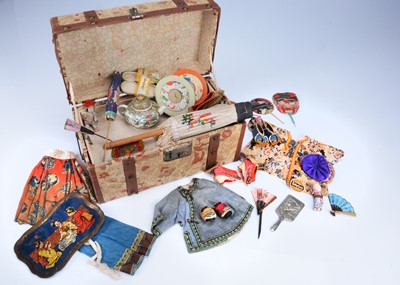 Lot 1089 - A doll's trunk with fabric covering of Asian printed fabric with Chinese and Japanese doll accessories