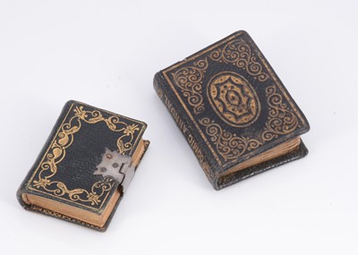 Lot 1105 - Two 19th century leather bound gilt tooled miniature dolls books