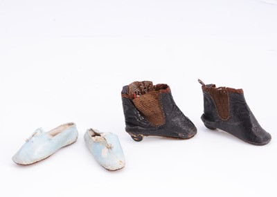 Lot 1110 - A pair of 19th century dolls shoes and boots
