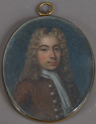 Lot 801 - A 19th century or earlier Portrait miniature  locket on ivory of a Georgian man