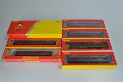 Lot 112 - Hornby (China) boxed 00 Gauge LMS maroon Coronation Scot Triple Pack together with Corridor and Suburban Coaches and two BR maroon Suburban and Full Brake Coaches (9 coaches)