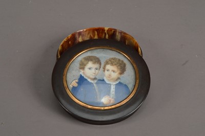 Lot 808 - A 19th century portrait miniature of two boys
