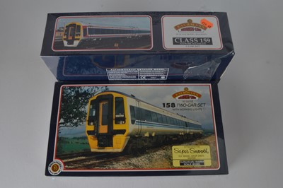 Lot 164 - Bachmann boxed 00 Gauge Class 158 2-Car and Class 159 3-car Train Packs (2)