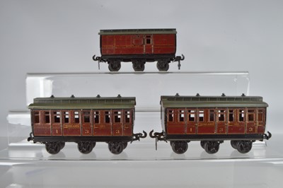 Lot 702 - 3 original  Carette O Gauge Clemisons 6 wheel coaches, Midland Railway, 1 x Brake  no 13313and 2 x 1st/3rd coaches No 13213 (3)