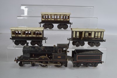 Lot 710 - A Marklin O Gauge Live Steam 4-4-0 North Eastern, 'Black Prince', No 1902, With 2 X 1ST class coaches and 1 x Brake (4)