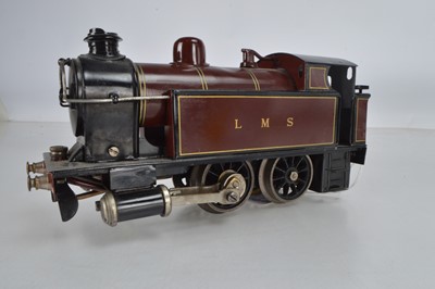 Lot 711 - A Marklin 0 Gauge live steam '0-4-0' LMS tank loco Maroon, with twin single acting cylinders and slip reversing