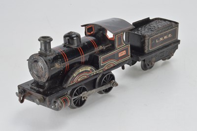 Lot 727 - Bing O Gauge 0-4-0 loco and tender, LNWR King George V, No 1902, label for Gamages to rear of tender