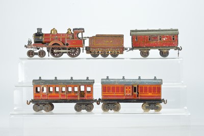 Lot 766 - Carette O Gauge 4-4-0 Locomotive and Tender in lined MR Maroon No 1632, with three Midland railway Coaches (4)
