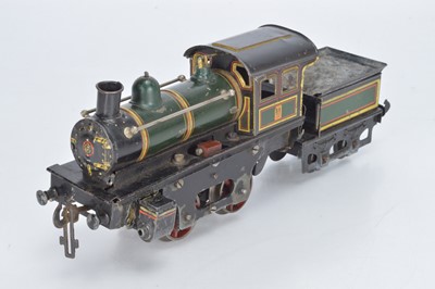 Lot 787 - Carette O Gauge 0-4-0 Locomotive and tender in green with red and yellow lining
