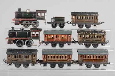 Lot 788 - Carette O Gauge 0-4-0 Locomotive and tender together with another Locomotive and  6 x coaches, (8)