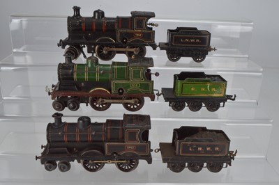 Lot 793 - Bing 4-4-0 Locomotive and tender, O gauge, GNR, No 410, together with a Bing 2-4-0 Locomotive and tender LNWR, No 1942 and another Bing 4-4-0 Locomotive and tender, LNWR, No 1942 (3)