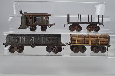 Lot 809 - Bing O Gauge Snow Plow, Bogie open wagon, 2 x bogie log wagons, (4)