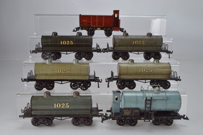 Lot 815 - Bing O Gauge Rolling Stock comprising 1 x bogie tanker No 62610 with brake house, 1 x open wagon No 62611 with Brake house and 4 x 1025 tankers, (6)