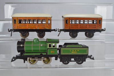 Lot 825 - Bing O Gauge 0-4-0 Locomotive and Tender, LNER No 8851 with 2 x LNER all 1st passenger coaches, No 2534 (3)