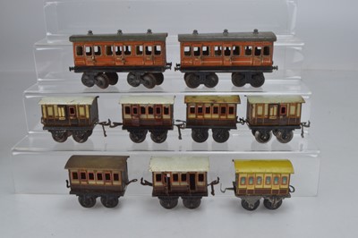 Lot 832 - Bing O Gauge  4 wheel coaches comprising 2 x L&NWR Full Brakes, 4  x L&NWR 1st/3rd passenger coaches, 1 x all 1st passenger coach and 2 x 8 wheel bogie coaches all 3rd, (9)