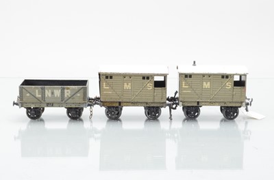 Lot 841 - Believed Carette for Bassett Lowke  O gauge rolling stock to include, 2 x LMS Brake Vans and 1 x LNWR 4 plank open wagon (3)