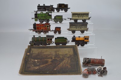 Lot 851 - A qty of Bing and other manufactures O gauge Locomotive and rolling stock and a Marklin box lid, (13)