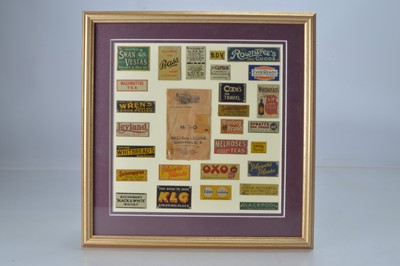 Lot 855 - A qty of Milbro and similar O Gauge miniature metal advertising signs to include 'Leyland', 'Cooks for Travel', 'Spratts Dog Food', together with a Milbro paper packet, (28)