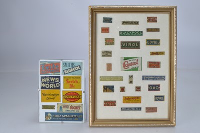 Lot 856 - A qty of Bassett Lowke and similar O Gauge miniature Metal advertising signs (35 signs, 2 frames)