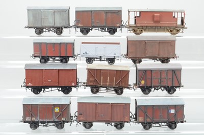 Lot 910 - A qty of kit / commercially built O gauge rolling stock to include, Gunpowder van, 7 plank wagon, 3 x Fish Vans, 1 x Banana Van, 4 x covered vans, 1 x Shocvan and a brake van   (12)