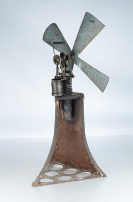 Lot 1046 - A Ky-Ko stirling hot air engine powered fan, standing approx 87cm to the top of the blade, with KYKO cast into the displacer cylinder casing