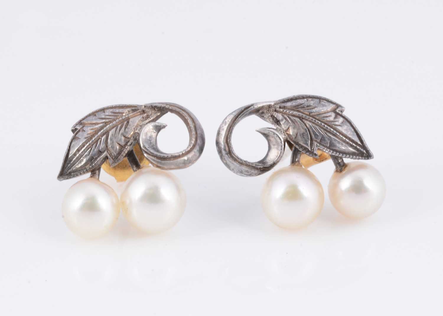 Lot 7 - A pair of Mid Century Mikimoto white metal pearl stud earrings