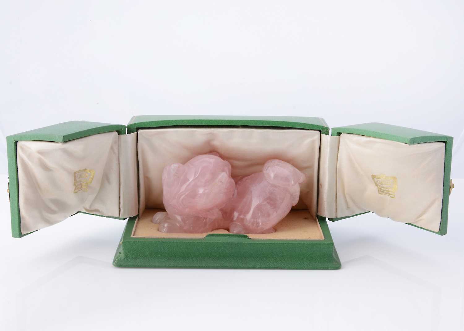 Lot 8 - A rose quartz carved foo dog, presented in a fitted green box marked Cartier