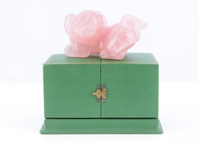 Lot 8 - A rose quartz carved foo dog, presented in a fitted green box marked Cartier