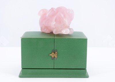 Lot 8 - A rose quartz carved foo dog, presented in a fitted green box marked Cartier