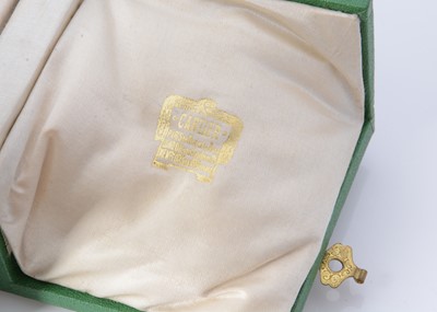 Lot 8 - A rose quartz carved foo dog, presented in a fitted green box marked Cartier