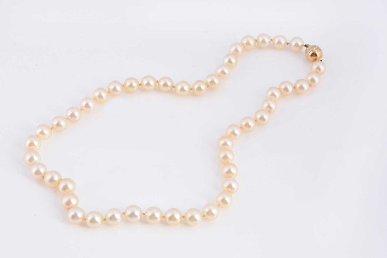 Lot 13 - A uniform knotted cultured pearl necklace