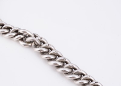 Lot 16 - An Edwardian silver double albert curb chain