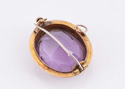 Lot 32 - An antique yellow metal amethyst & seed pearl brooch