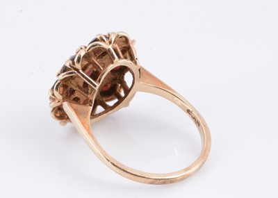 Lot 33 - A 9ct gold garnet flower cluster dress ring