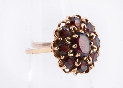 Lot 33 - A 9ct gold garnet flower cluster dress ring