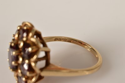 Lot 33 - A 9ct gold garnet flower cluster dress ring
