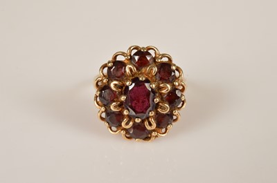 Lot 33 - A 9ct gold garnet flower cluster dress ring